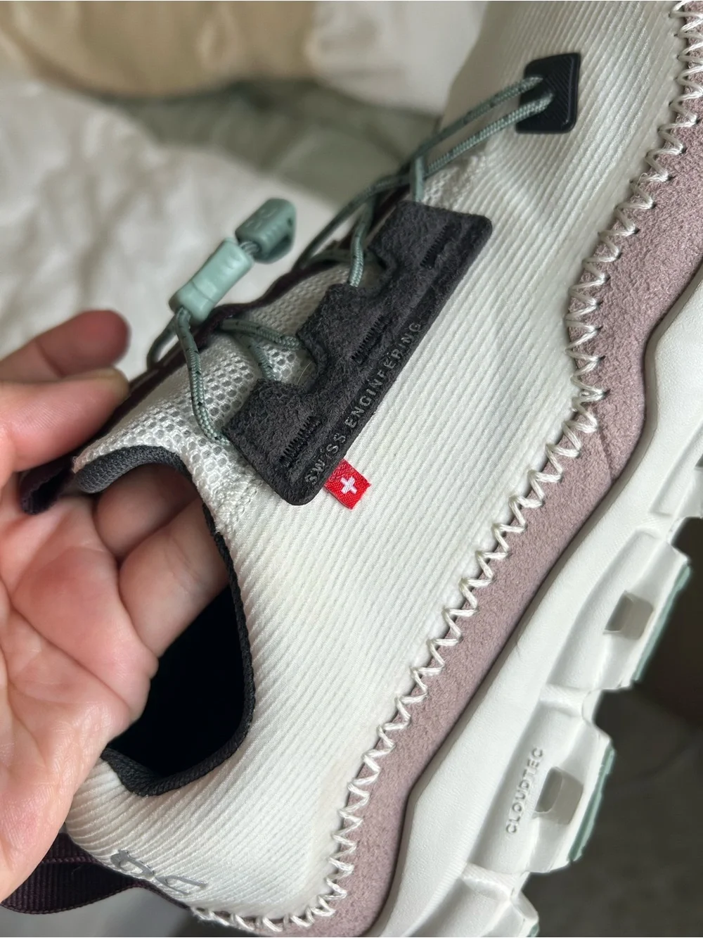 On Running women’s cloudaway Lace-Up Sneakers in White and Light Pink